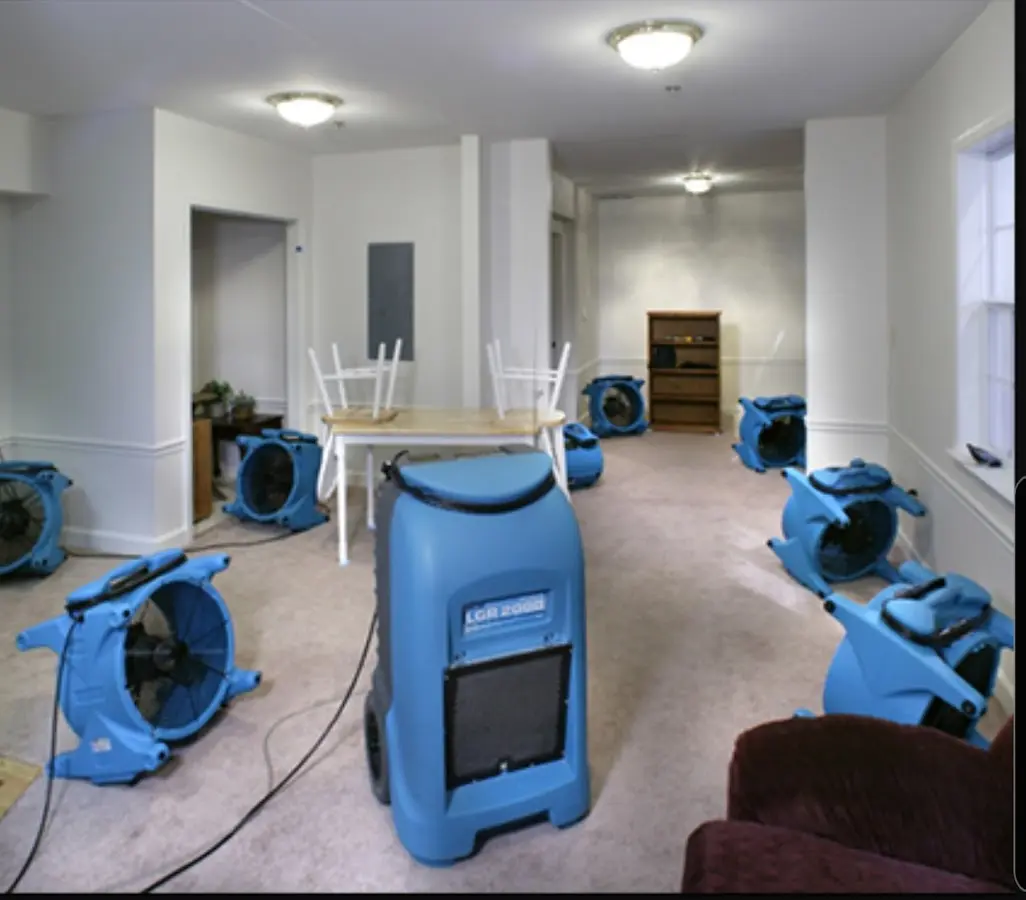 Air movers and dehumidifier setup for Water Extraction & Removal in Derby
